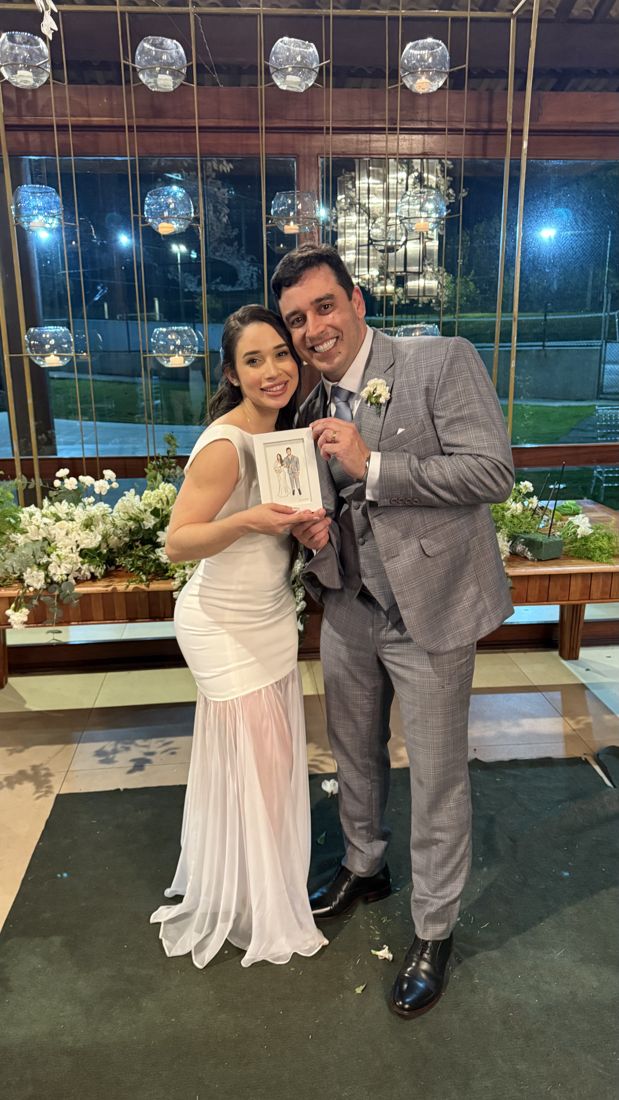 Casal com o retrato pintado ao vivo