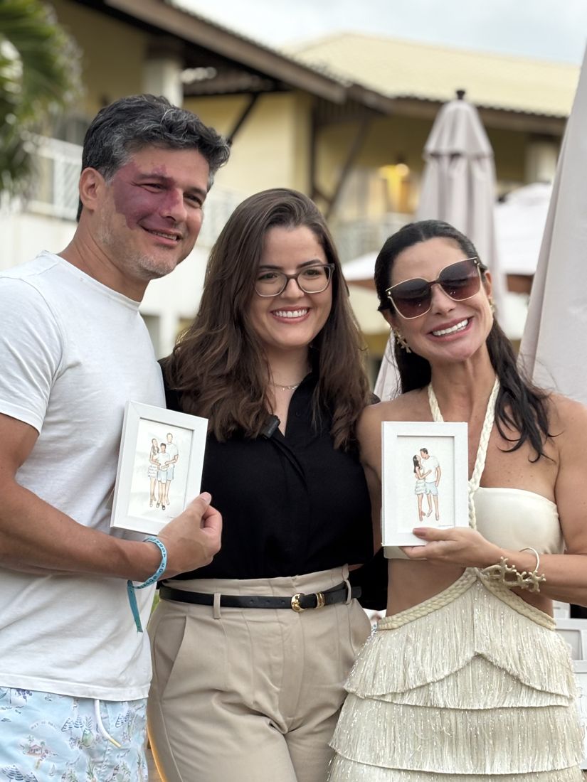 Convidados com seus retratos pintados ao vivo