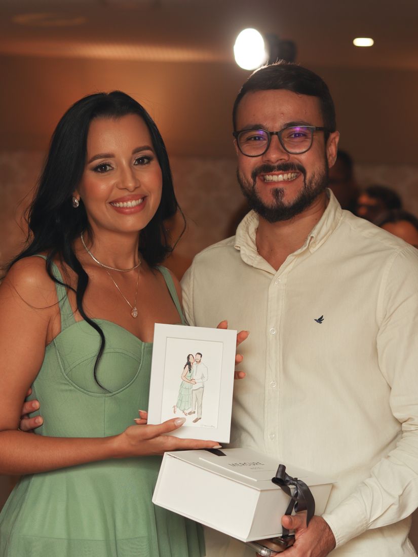 Casal com os retratos pintados ao vivo