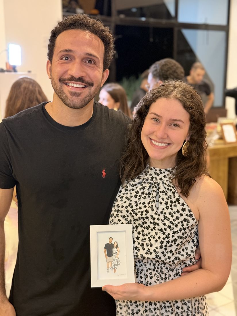 Casal com o retrato pintado ao vivo
