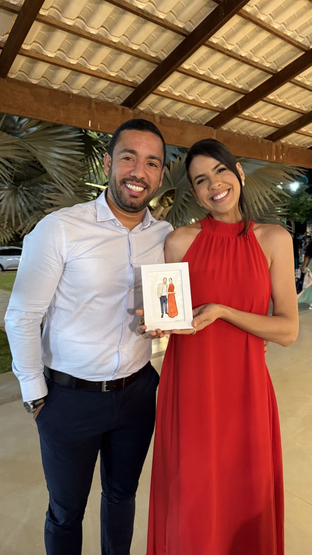 Casal com o retrato pintado ao vivo